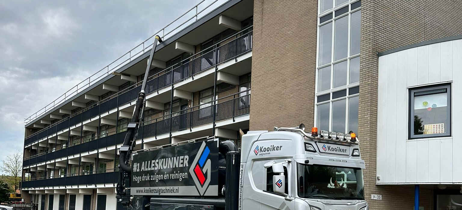 Dakgrind zuigen flatgebouw Almelo